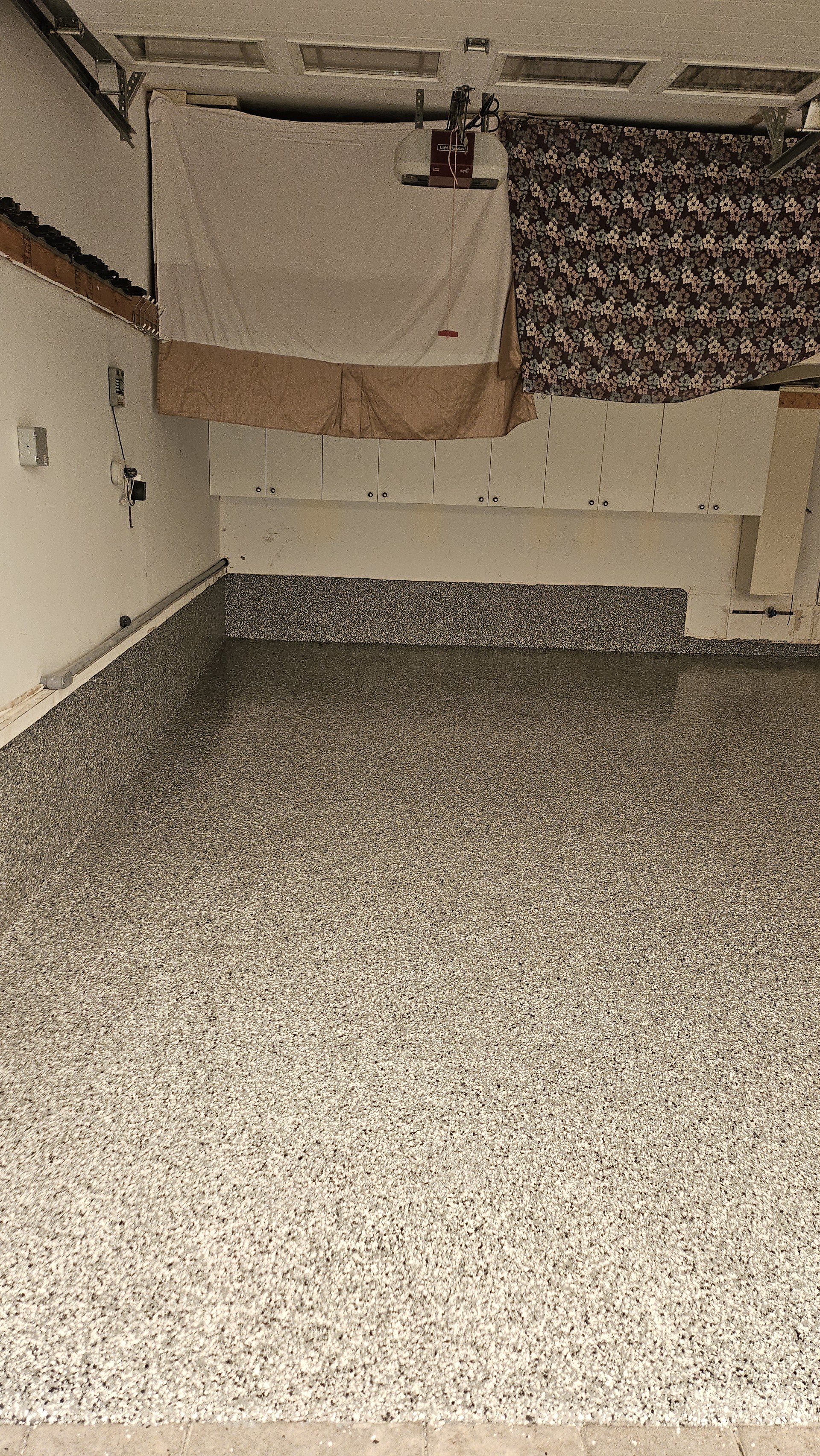 Completed full flake epoxy garage floor by Prime Surface Systems Inc. in Brampton, Ontario